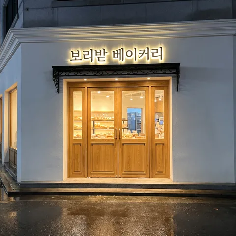 Rainy night storefront · Storefront cream stone · Film storefront